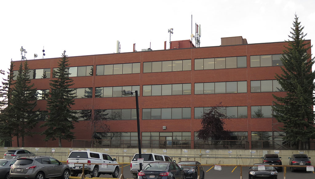 brick building with rows of windows