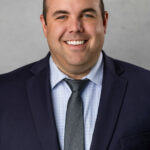 Bryce McQueen in a suit
