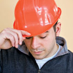 Sad construction worker
