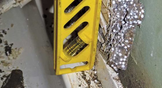 level next to flange showing no overlap