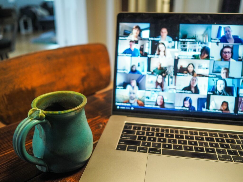 Committee meeting on Zoom with coffee cup.