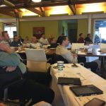 group listening to a speaker