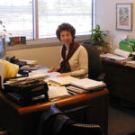 micki at a desk