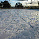 a roof with beaded water
